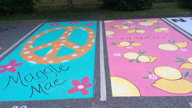 Fitch High School Seniors Paint Parking Spots as Fundraiser